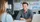 a-young-financial-advisor-sitting-at-a-modern-desk.png